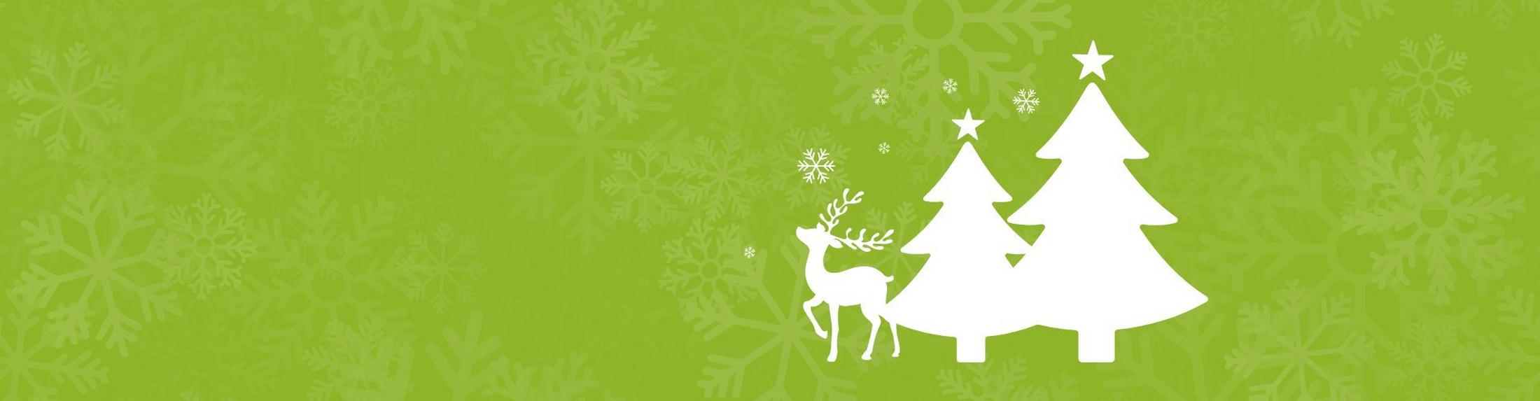 a green christmas card with a white deer and trees
